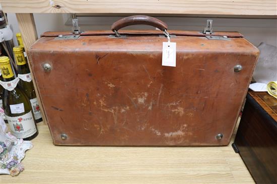 A vintage leather suitcase by John Pound & Co, Regent Street